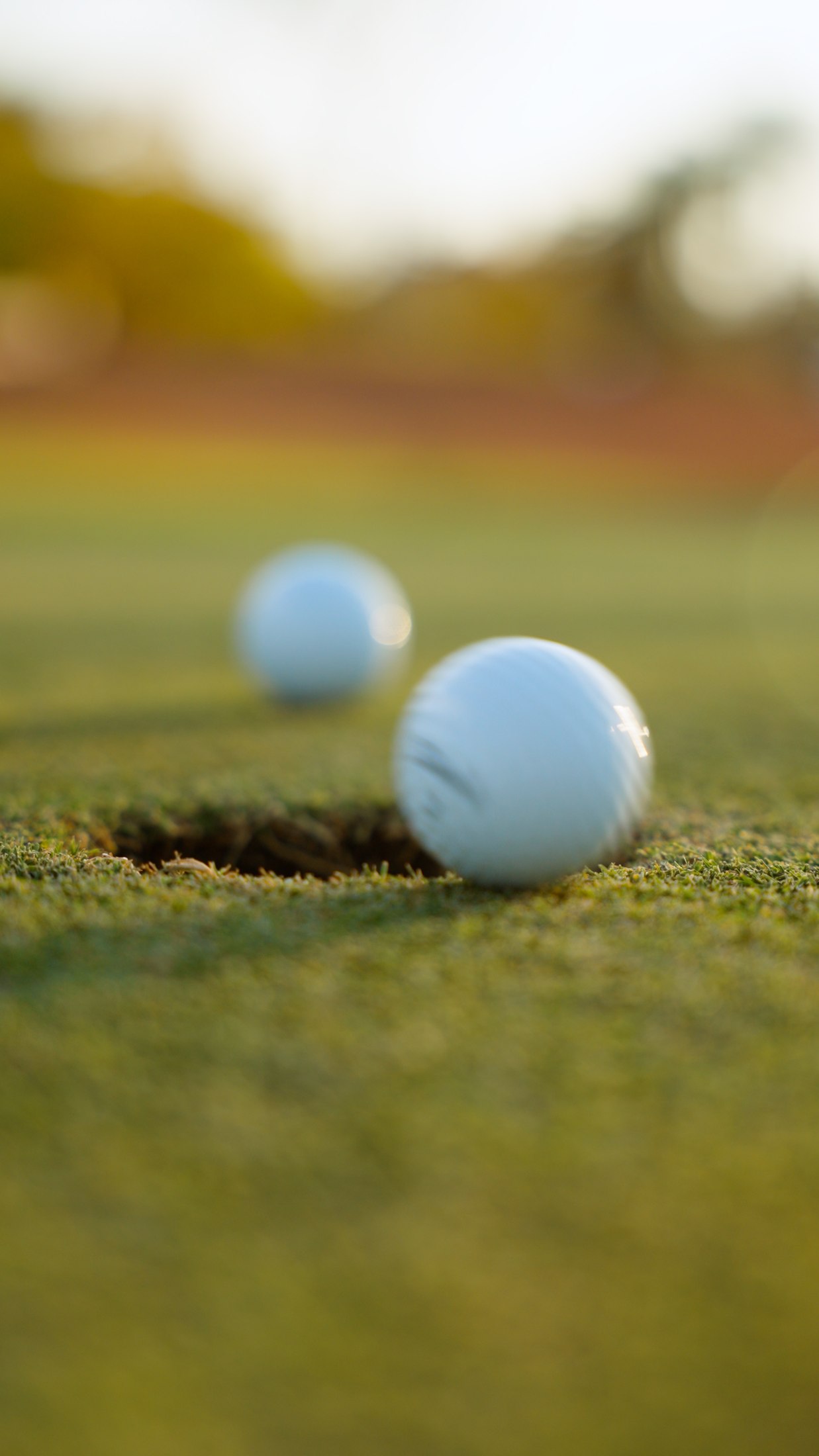 Golf ball framed in shallow focus