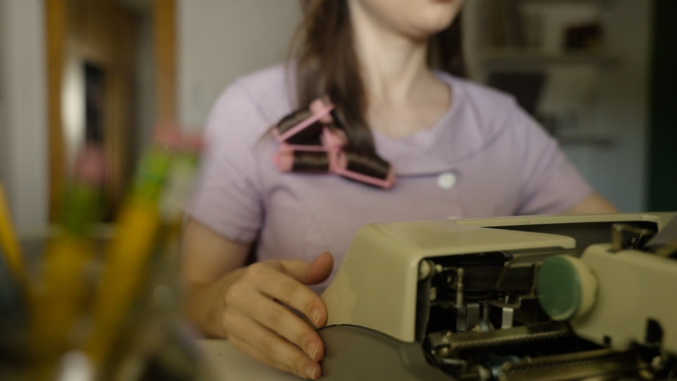 Close detail of a typewriter in use